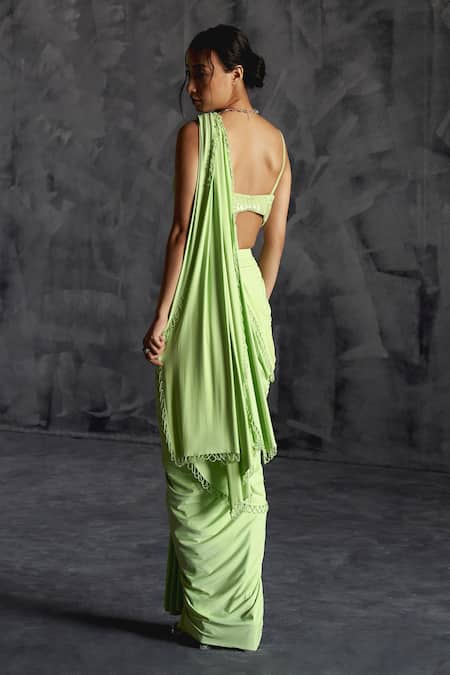 Shop Manika Nanda Green Silk, Lycra Beads, Tassel Embellished Border Pre-draped Saree With Blouse at Aza Fashions Shop_Manika Nanda_Green Silk, Lycra Beads, Tassel Embellished Border Pre-draped Saree With Blouse _at_Aza_Fashions