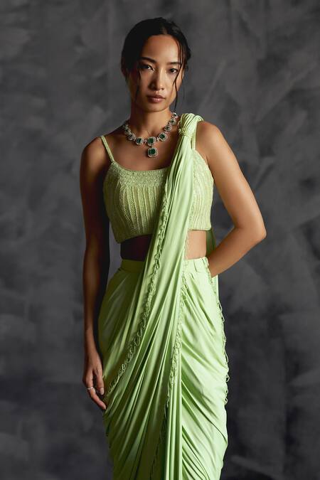Manika Nanda Green Silk, Lycra Beads, Tassel Embellished Border Pre-draped Saree With Blouse Online at Aza Fashions Manika Nanda_Green Silk, Lycra Beads, Tassel Embellished Border Pre-draped Saree With Blouse _Online_at_Aza_Fashions