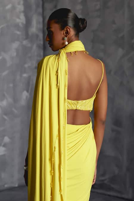 Shop Manika Nanda Yellow Silk, Lycra Flora Embroidered Blouse With Tassel Border Pre-draped Saree at Aza Fashions Shop_Manika Nanda_Yellow Silk, Lycra Flora Embroidered Blouse With Tassel Border Pre-draped Saree _at_Aza_Fashions