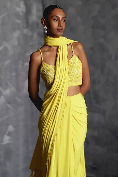 Manika Nanda Yellow Silk, Lycra Flora Embroidered Blouse With Tassel Border Pre-draped Saree Online at Aza Fashions Manika Nanda_Yellow Silk, Lycra Flora Embroidered Blouse With Tassel Border Pre-draped Saree _Online_at_Aza_Fashions