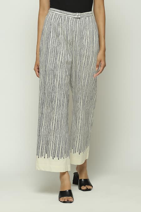 Shop Abraham And Thakore Black Cotton Embroidery Crewel Print Straight Trouser at Aza Fashions Shop_Abraham And Thakore_Black Cotton Embroidery Crewel Print Straight Trouser_at_Aza_Fashions