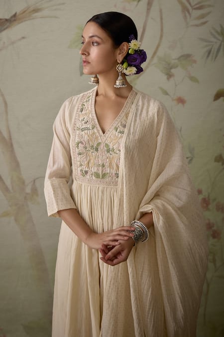 Kritika Dawar_Ivory Chanderi, Cotton Embroidery, Lace V-neck Botanic Hand Yoke Kurta Set _at_Aza_Fashions