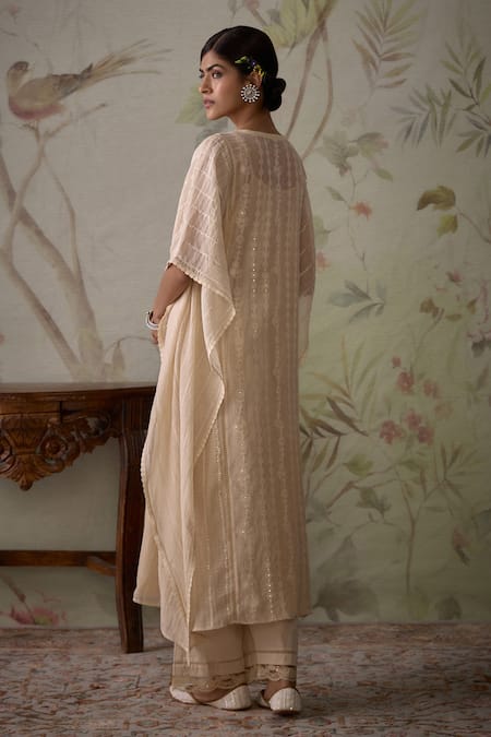 Shop Kritika Dawar Ivory Chanderi, Cotton Embroidery, Lace Split Floral Hand Kaftan And Pant Set at Aza Fashions Shop_Kritika Dawar_Ivory Chanderi, Cotton Embroidery, Lace Split Floral Hand Kaftan And Pant Set _at_Aza_Fashions