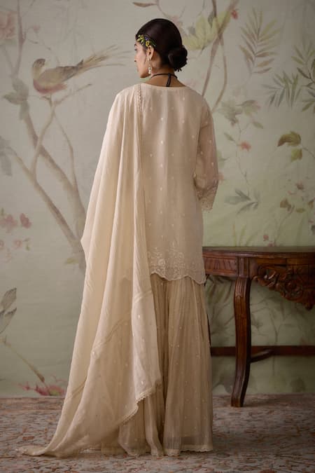 Shop Kritika Dawar Ivory Chanderi Embroidery, Pearls V-neck Floral Short Kurta Gharara Set at Aza Fashions Shop_Kritika Dawar_Ivory Chanderi Embroidery, Pearls V-neck Floral Short Kurta Gharara Set _at_Aza_Fashions