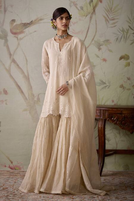 Buy Kritika Dawar Ivory Chanderi Embroidery, Pearls V-neck Floral Short Kurta Gharara Set Online at Aza Fashions Buy_Kritika Dawar_Ivory Chanderi Embroidery, Pearls V-neck Floral Short Kurta Gharara Set _Online_at_Aza_Fashions