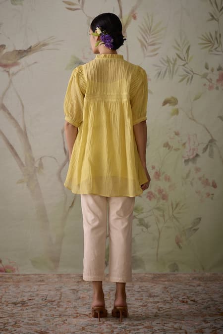 Shop Kritika Dawar Yellow Chanderi, Cotton Embroidery High Neck Short Pintucked Tunic And Pant Set at Aza Fashions Shop_Kritika Dawar_Yellow Chanderi, Cotton Embroidery High Neck Short Pintucked Tunic And Pant Set _at_Aza_Fashions