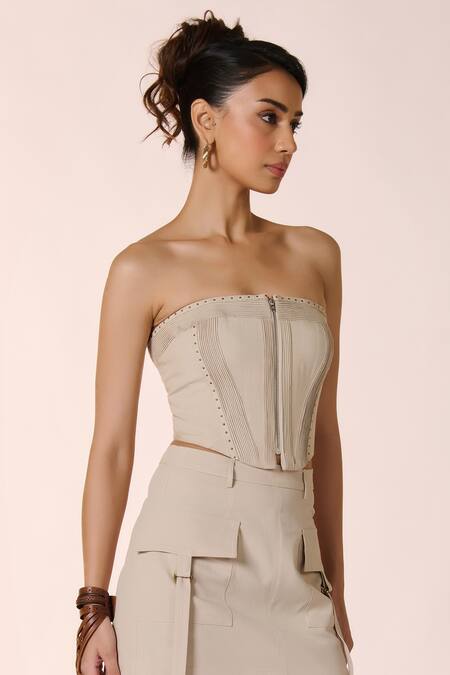 Buy S&N By Shantnu Nikhil Beige Lycra, Rayon Rhinestones Off-shoulder Rivet Embellished Corset Top Online at Aza Fashions Buy_S&N By Shantnu Nikhil_Beige Lycra, Rayon Rhinestones Off-shoulder Rivet Embellished Corset Top_Online_at_Aza_Fashions