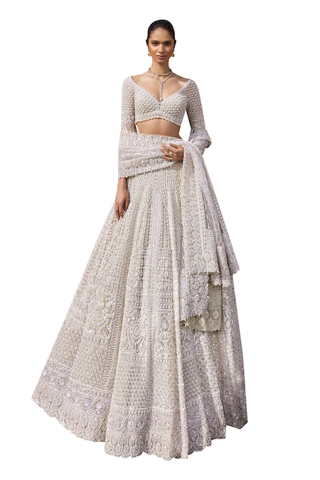 Seema Gujral_Beige Net Pearls, Sequins, Embroidery V-neck Bridal Lehenga Set _Online_at_Aza_Fashions