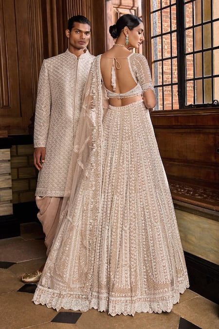 Shop Seema Gujral Gold Net Pearls, Sequins, Beads Sweetheart Embroidered Bridal Lehenga Blouse Set Shop_Seema Gujral_Gold Net Pearls, Sequins, Beads Sweetheart Embroidered Bridal Lehenga Blouse Set