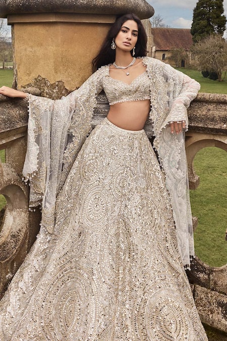 Seema Gujral_Cream Net Crystals, Embroidery, Mirrors Sweetheart Neck Bridal Lehenga Set _Online_at_Aza_Fashions
