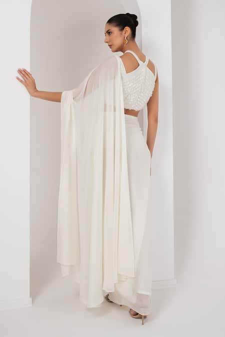Akara_Ivory Georgette Crystals Halter Neck Pre-draped Saree With Tassel Blouse _Online_at_Aza_Fashions