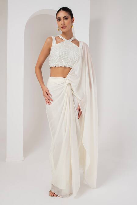 Buy_Akara_Ivory Georgette Crystals Halter Neck Pre-draped Saree With Tassel Blouse _Online_at_Aza_Fashions