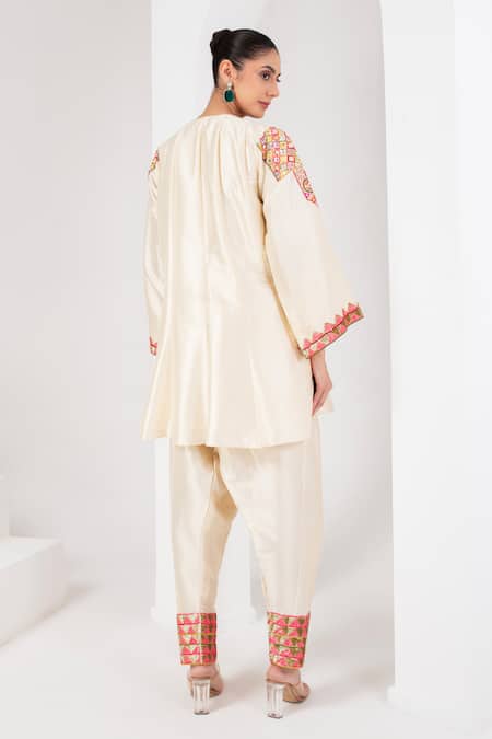 Shop Akara Ivory Taffeta, Silk Mirrors, Sequins, Pearls, And Yoke Kurta With Salwar at Aza Fashions Shop_Akara_Ivory Taffeta, Silk Mirrors, Sequins, Pearls, And Yoke Kurta With Salwar _at_Aza_Fashions