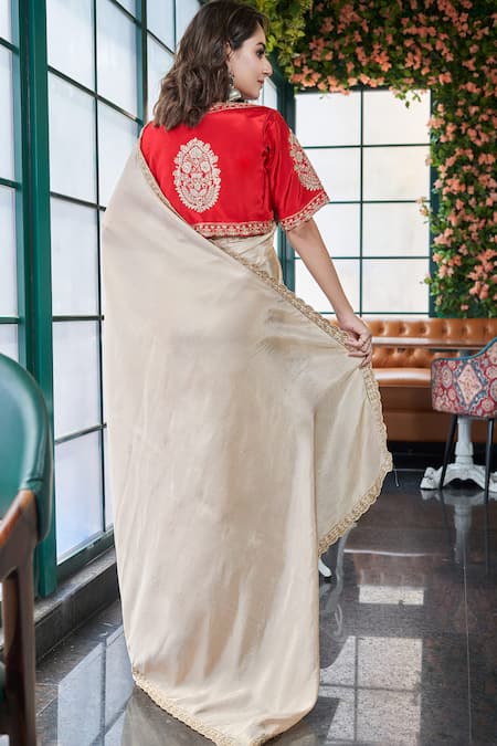 Shop Sayisha Gold Silk Sequins, Beads V-neck Embroidered Scallop Hem Saree With Blouse at Aza Fashions Shop_Sayisha_Gold Silk Sequins, Beads V-neck Embroidered Scallop Hem Saree With Blouse _at_Aza_Fashions