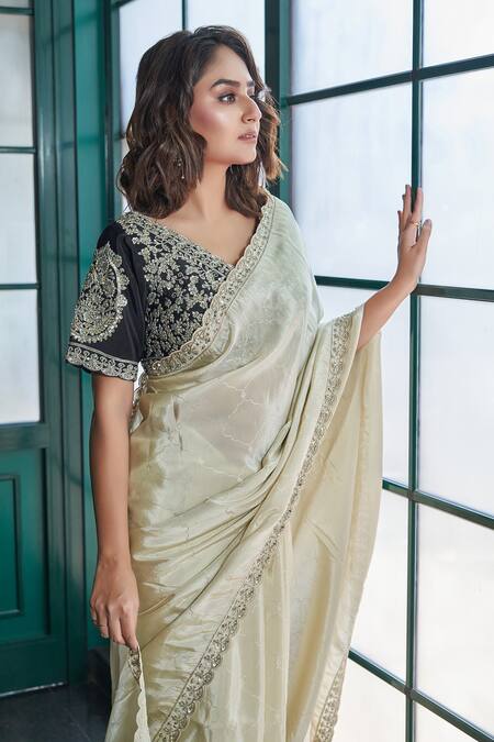 Sayisha_Beige Silk, Tissue Sequins, Beads V-neck Scallop Hem Saree With Blouse_at_Aza_Fashions