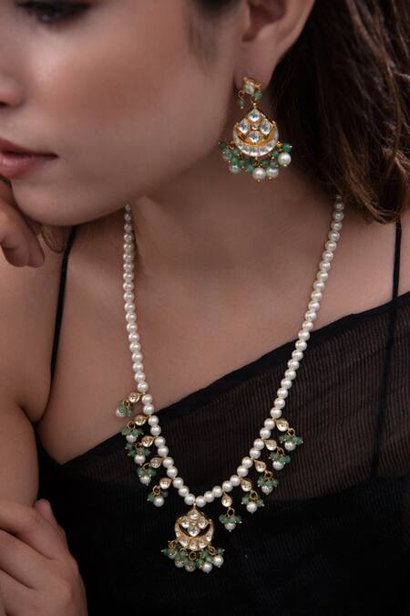 Do Taara Gold Plated Pearls, Diamonds, Stones Crescent Cutwork Pendant Necklace Set Online at Aza Fashions Do Taara_Gold Plated Pearls, Diamonds, Stones Crescent Cutwork Pendant Necklace Set _Online_at_Aza_Fashions