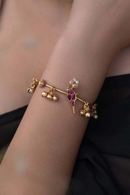 Do Taara Red Stones Peacock Carved Motif Bracelet Online at Aza Fashions Do Taara_Red Stones Peacock Carved Motif Bracelet _Online_at_Aza_Fashions