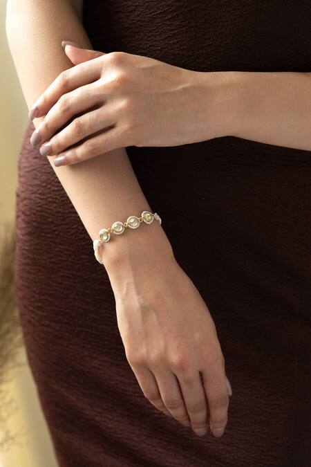 Buy Do Taara Gold Plated Crystals, Pearls Kundan Embellished Bracelet Online at Aza Fashions Buy_Do Taara_Gold Plated Crystals, Pearls Kundan Embellished Bracelet _Online_at_Aza_Fashions