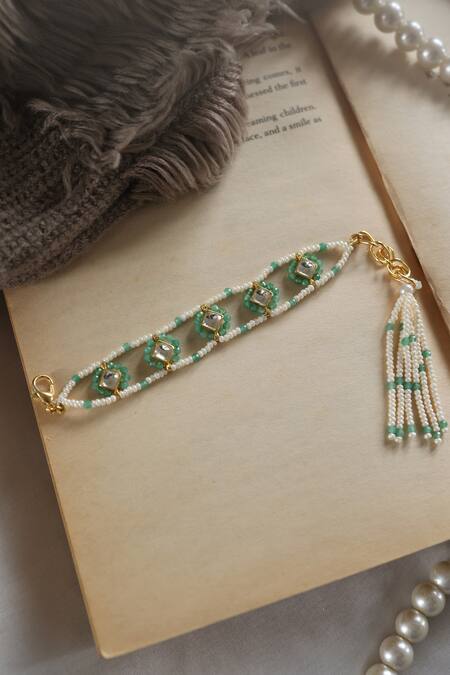 Shop Do Taara Green Crystals, Pearls Kundan Embellished Cutwork Bracelet at Aza Fashions Shop_Do Taara_Green Crystals, Pearls Kundan Embellished Cutwork Bracelet _at_Aza_Fashions