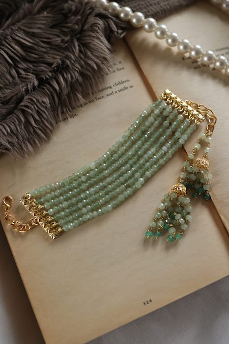 Shop Do Taara Green Stones Onyx Embellished Jhumka Tassel Bracelet at Aza Fashions Shop_Do Taara_Green Stones Onyx Embellished Jhumka Tassel Bracelet _at_Aza_Fashions
