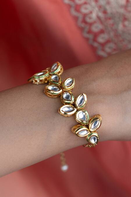 Buy Do Taara Gold Plated Pearls Shell Embellished Jadau Earrings Online at Aza Fashions Buy_Do Taara_Gold Plated Pearls Shell Embellished Jadau Earrings _Online_at_Aza_Fashions