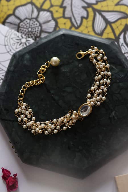 Shop Do Taara Gold Plated Pearls Kundan Embellished Multi Strand Bracelet at Aza Fashions Shop_Do Taara_Gold Plated Pearls Kundan Embellished Multi Strand Bracelet _at_Aza_Fashions