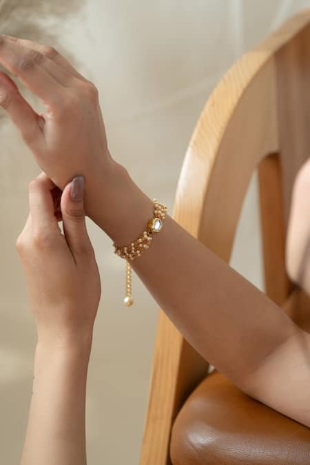 Do Taara Gold Plated Pearls Kundan Embellished Multi Strand Bracelet Online at Aza Fashions Do Taara_Gold Plated Pearls Kundan Embellished Multi Strand Bracelet _Online_at_Aza_Fashions