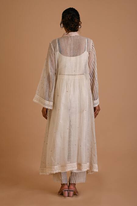 Shop Mityan Ivory Jute Silk Hand Embroidered Floral V Neck Asper Tunic With Inner at Aza Fashions Shop_Mityan_Ivory Jute Silk Hand Embroidered Floral V Neck Asper Tunic With Inner _at_Aza_Fashions