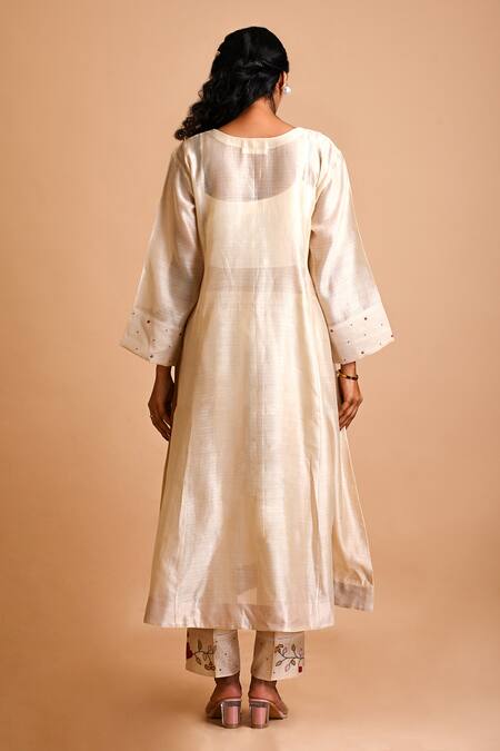 Shop Mityan Ivory Silk Chanderi Hand Embroidered Floral Bellflower Yoke Tunic With Inner at Aza Fashions Shop_Mityan_Ivory Silk Chanderi Hand Embroidered Floral Bellflower Yoke Tunic With Inner _at_Aza_Fashions