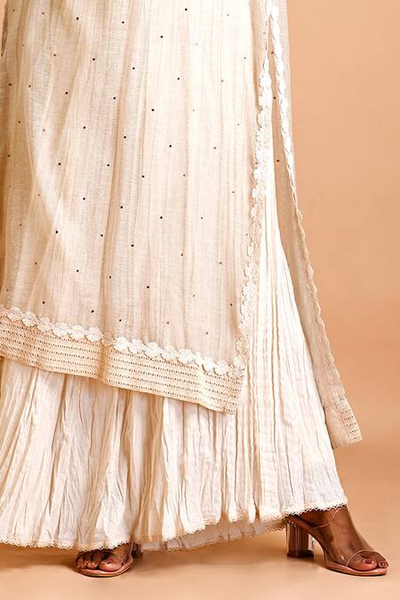 Mityan Ivory Jute Silk Hand Embroidered Polka Dots Bryony Asymmetric Tunic With Inner Online at Aza Fashions Mityan_Ivory Jute Silk Hand Embroidered Polka Dots Bryony Asymmetric Tunic With Inner _Online_at_Aza_Fashions