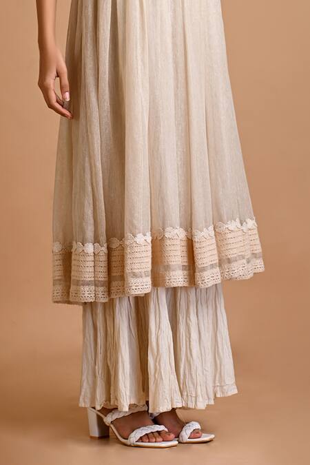 Mityan Ivory Jute Silk Hand Embroidery Floral Round Dock Dress With Inner Online at Aza Fashions Mityan_Ivory Jute Silk Hand Embroidery Floral Round Dock Dress With Inner _Online_at_Aza_Fashions
