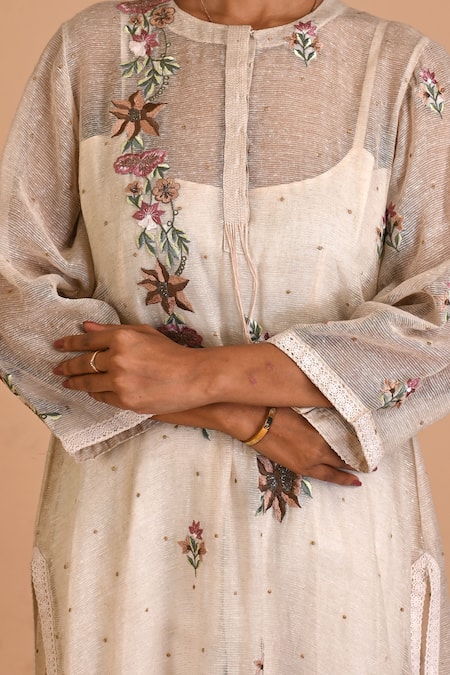 Buy_Mityan_Ivory Jute Silk Embroidered Thread Round Myrtle Floral Tunic _Online_at_Aza_Fashions