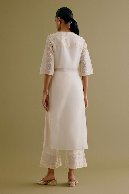 Shop Devnaagri Ivory Silk, Chanderi Embroidery V-neck Straight Kurta And Pant Set at Aza Fashions Shop_Devnaagri_Ivory Silk, Chanderi Embroidery V-neck Straight Kurta And Pant Set _at_Aza_Fashions