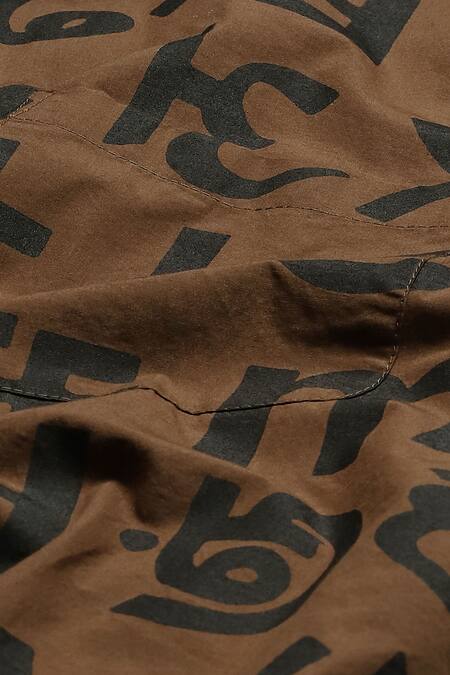 Abraham And Thakore Brown Cotton Spaced Out Calligraphy Print Shirt at Aza Fashions Abraham And Thakore_Brown Cotton Spaced Out Calligraphy Print Shirt_at_Aza_Fashions