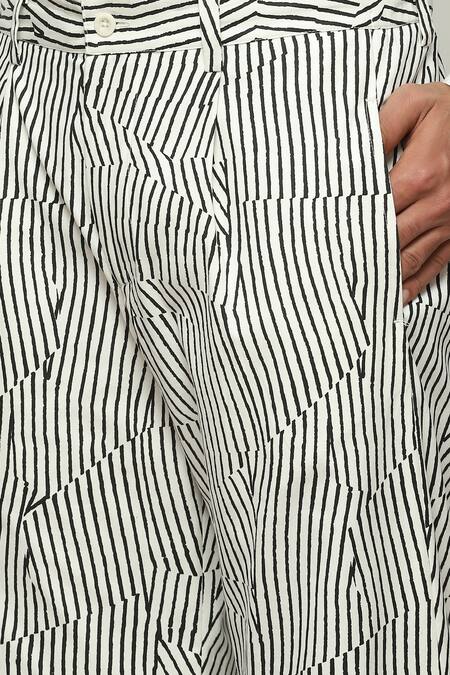 Abraham And Thakore White Cotton Broken Pinstripe Motif Pant at Aza Fashions Abraham And Thakore_White Cotton Broken Pinstripe Motif Pant _at_Aza_Fashions