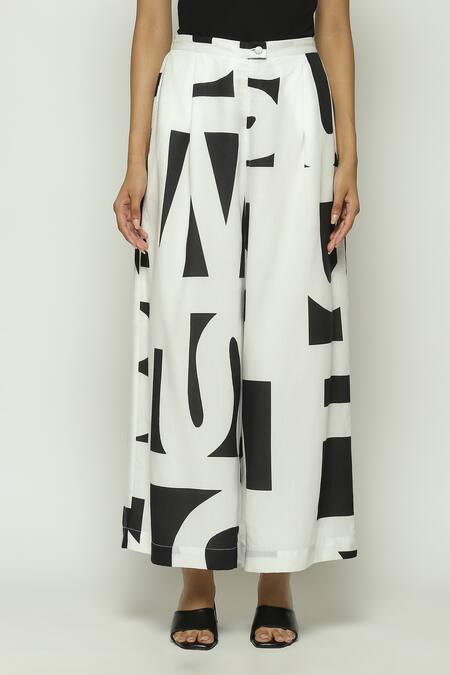 Abraham And Thakore_White Tencel Calligraphy Pattern Trouser_Online_at_Aza_Fashions