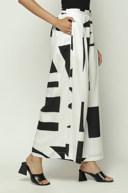 Shop_Abraham And Thakore_White Tencel Calligraphy Pattern Trouser_Online_at_Aza_Fashions