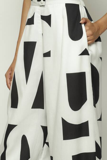 Abraham And Thakore_White Tencel Calligraphy Pattern Trouser_at_Aza_Fashions