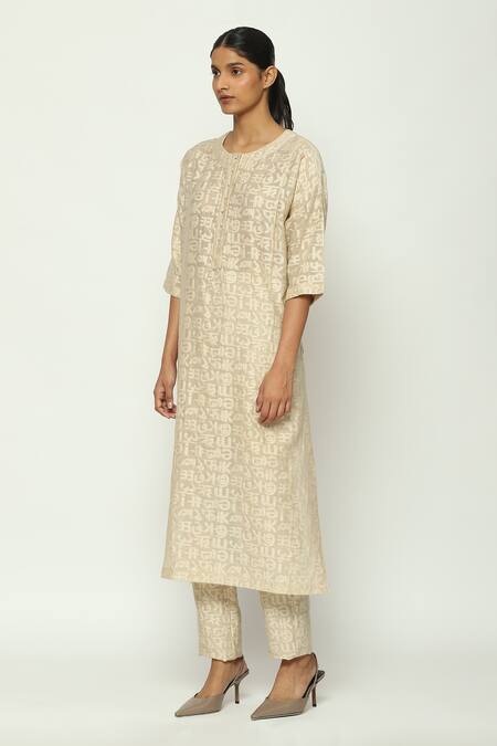 Abraham And Thakore_Beige Chanderi Cut Work Round Neck Calligraphy A Line Kurta _Online_at_Aza_Fashions