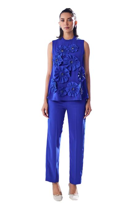 House Of Zeniaa Blue Crepe Fabric Flowers Ibiza Embellished Top And Pant Set at Aza Fashions House Of Zeniaa_Blue Crepe Fabric Flowers Ibiza Embellished Top And Pant Set_at_Aza_Fashions