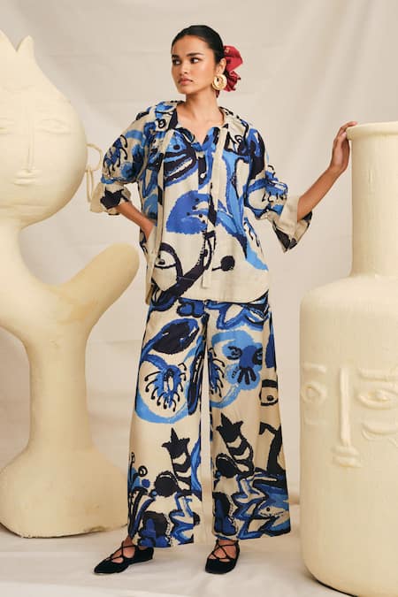 Shop Jodi Blue Modal Pearls, Embroidery Tulika Stroke Hand Painted Blouse And Trouser Set at Aza Fashions Shop_Jodi_Blue Modal Pearls, Embroidery Tulika Stroke Hand Painted Blouse And Trouser Set _at_Aza_Fashions