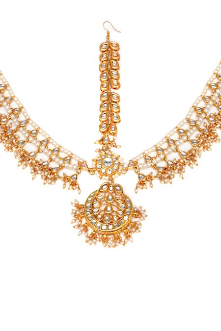 Ruby Raang Gold Plated Kundan And Pearl Embellished Mathapatti Online at Aza Fashions Ruby Raang_Gold Plated Kundan And Pearl Embellished Mathapatti _Online_at_Aza_Fashions