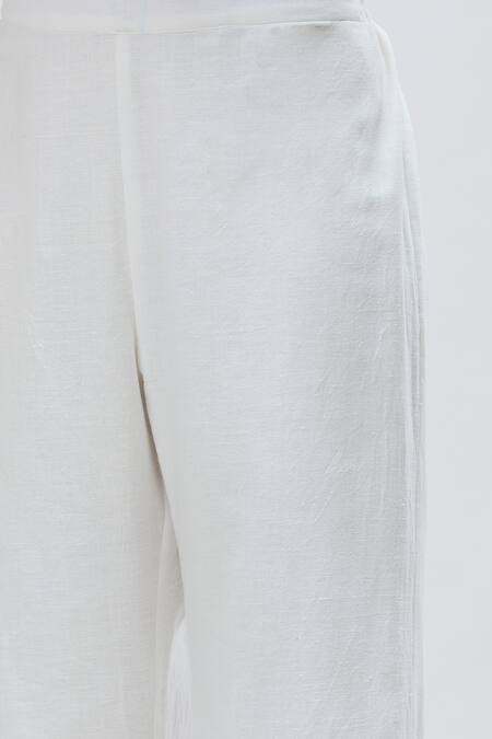 Shop_Ibai_White Handwoven Pure Cotton Solid Dove Flared Pant_Online_at_Aza_Fashions