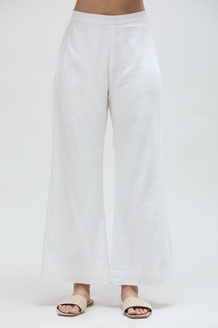 Ibai_White Handwoven Pure Cotton Solid Dove Flared Pant_at_Aza_Fashions