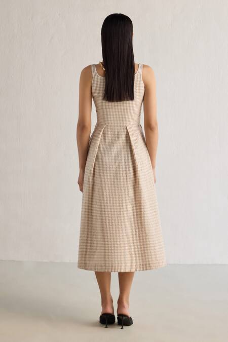 Shop Mellowdrama Beige Cotton Round Neck Checks Pattern Midi Dress at Aza Fashions Shop_Mellowdrama_Beige Cotton Round Neck Checks Pattern Midi Dress_at_Aza_Fashions