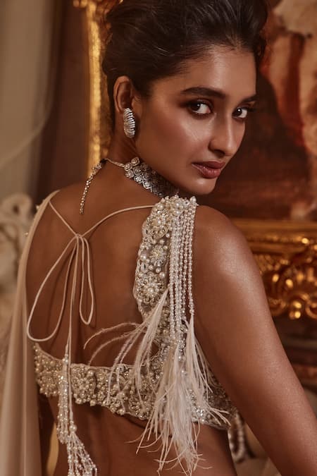 Roqa Ivory Modal, Net Pearls, Perseus Embroidered Pre-draped Saree With Blouse Online at Aza Fashions Roqa_Ivory Modal, Net Pearls, Perseus Embroidered Pre-draped Saree With Blouse _Online_at_Aza_Fashions
