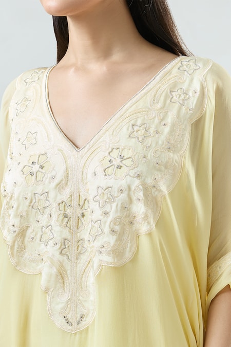 Seams Pret And Couture Yellow Georgette Embroidered Thread V-neck Winnie Aura Kaftan Dress at Aza Fashions Seams Pret And Couture_Yellow Georgette Embroidered Thread V-neck Winnie Aura Kaftan Dress _at_Aza_Fashions