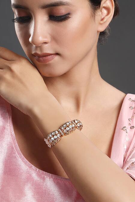 HRISHA Gold Plated Crystals, Pearls Kundan Polki Embellished Bracelet Online at Aza Fashions HRISHA_Gold Plated Crystals, Pearls Kundan Polki Embellished Bracelet _Online_at_Aza_Fashions