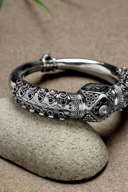 Shop Mero Jewellery Red Stones Ruby Studded Carved Kada at Aza Fashions Shop_Mero Jewellery_Red Stones Ruby Studded Carved Kada _at_Aza_Fashions