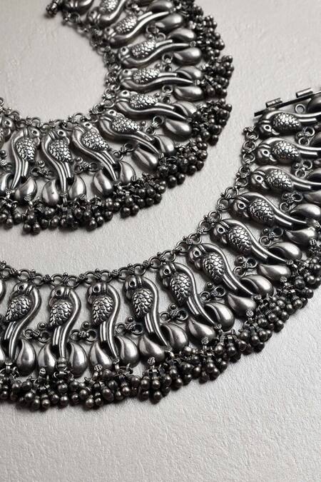 Shop Mero Jewellery Silver Plated Gota Patti Big Peacock Carved Anklet - Set Of 2 at Aza Fashions Shop_Mero Jewellery_Silver Plated Gota Patti Big Peacock Carved Anklet - Set Of 2 _at_Aza_Fashions